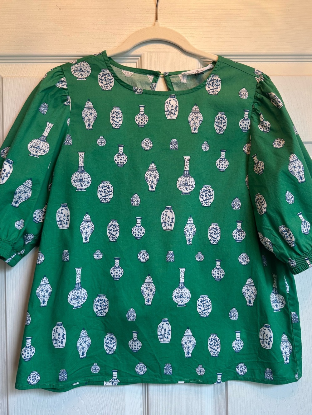 Michelle McDowell Green Top with Blue & White Vase Motif